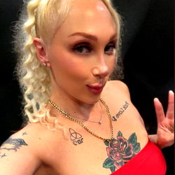 OnlyFans Model Alexiss in a Red Fishnet Swimsuit