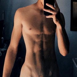 A 25-Year-Old Male Model Poses for the Camera