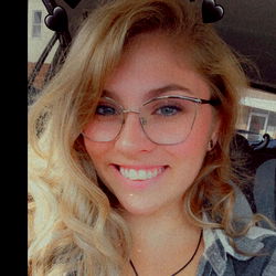 Smiling Woman in Glasses