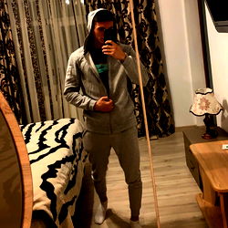 Onlyfans Model Showcasing Fashionable Athletic Wear in Modern Room