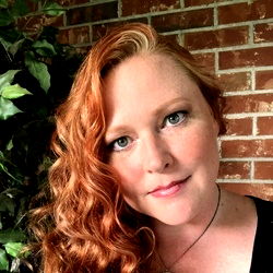 Woman with Red Hair and Tattoos