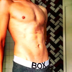 Onlyfans Model Showcasing Abs and Boxers in Scotland