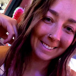 Kenzie's Smiling Selfie in Purple Shirt