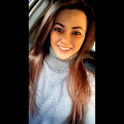 Alyssa - Smiling Portrait with Long Hair, Casual Sweater and Car in Background