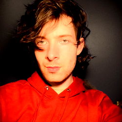 Jasper's Serious Expression with Hoodie