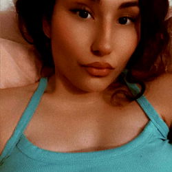 OnlyFans model Tainybrat in a relaxed pose