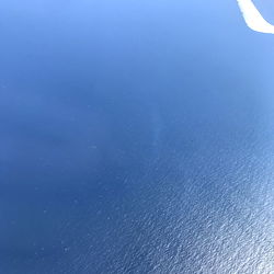 Aerial View of the Ocean From a Private Jet