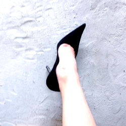 High Heel Elegance on Concrete Surface