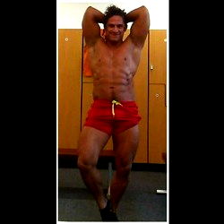 Fit and Muscular Bodybuilder in Gym