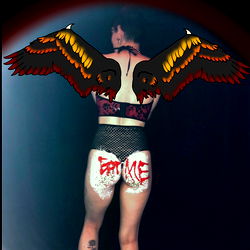 Angelic Photoshoot: Onlyfans Model Angel Showcasing Artistic Tattoos