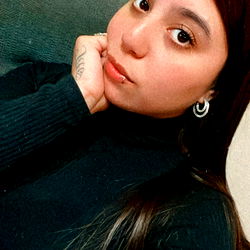 Sitting Model in a Black Sweater