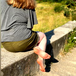 Amber Palm: Relaxing by the Wall