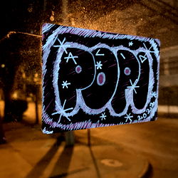 A Vandalized Street Sign