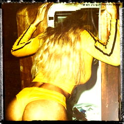 Onlyfans Model Fia: Bold and Beautiful in Yellow