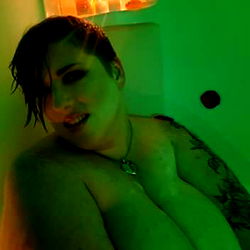 Intimate Moment in Green Bathroom with AmazonianBomb
