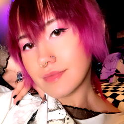 Stylized Portrait of a Person with Short Hair and Pink Dye