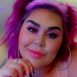 Colorful OnlyFans Model with Vivid Eye Shadow and Purple Hair in Party Crown, 35 years old