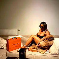 OnlyFans Model Ailyn Osorio Poses for a Photo in Her Living Room