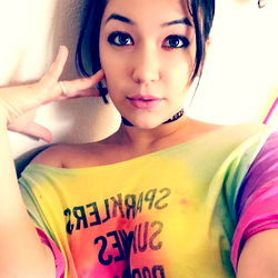 Maybel Vixen in a Colorful Tie-Dye Shirt