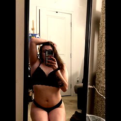 A Model Showcasing a Mirror Selfie