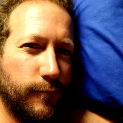 Bearded Man in Bed