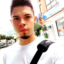 Posing for a selfie, Alex is on the move