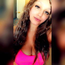 BabyGirl Star - OnlyFans Model in Pink Tank Top
