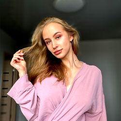 OnlyFans Model Candy Kate in Pink Robe, Blonde Hair, Captivating Smile