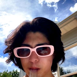 Stylish and Andrew, a Rochester, NY model in sunglasses