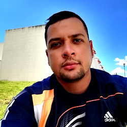 Adan, a Man with Short Hair and Tattoo