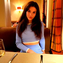 Stylish Alison Posing in a Restaurant