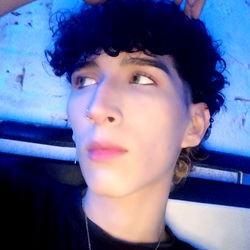 Model Adrian in a Blue Room