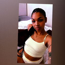 Model Tee Poses in Bikini