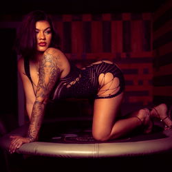 Striking Pose in a Seductive Setting