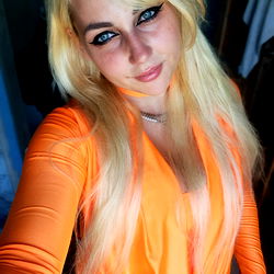 Woman in Orange Jumpsuit