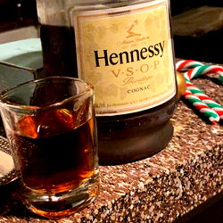 Whiskey Bottle and Glass on Counter