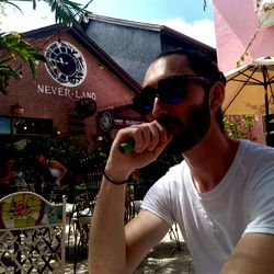 A Man Relaxing at a Cafe