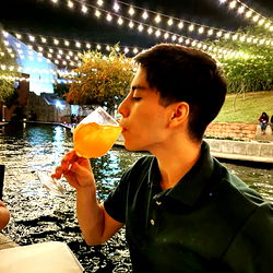 Agur Danny Enjoying a Drink Outdoors