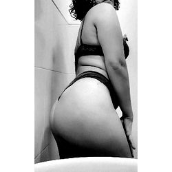 Alessiath, OnlyFans Model Showcasing Her Figure in a White Tile Bathroom