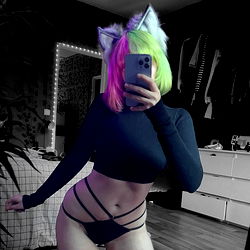 Vividly Colored Cat-Inspired Costume, Model in Black Lingerie with Multi-Colored Hair and Facepaint