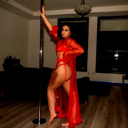 Model in Red Latex Dress and Stiletto Heels