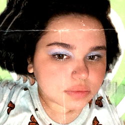 Young Woman with Butterfly Motif, Posing for Selfie