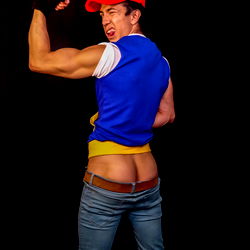 AlphaTwink: A Muscular Model Striking a Powerful Pose