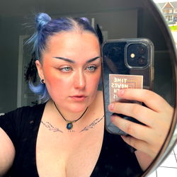 Asher 🗡, a Canadian OnlyFans Model Taking an Intimate Selfie