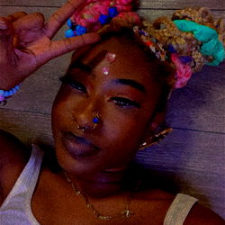 AstroWorld Model KiddieKat Posing with Peace Sign