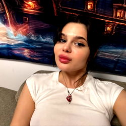 ArianaBabe poses for a photo