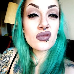 Vivid Vixen in Tattoo'd Teal Hair