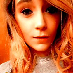 Stylish Blonde Woman Posing for Selfie