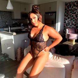 Onlyfans Valeria: Elegant in Lingerie, Leaning on Sofa