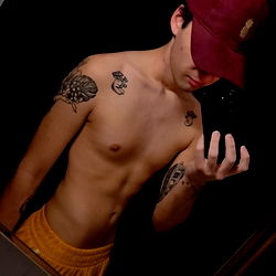 Shirtless Fitness Model in Casual Attire